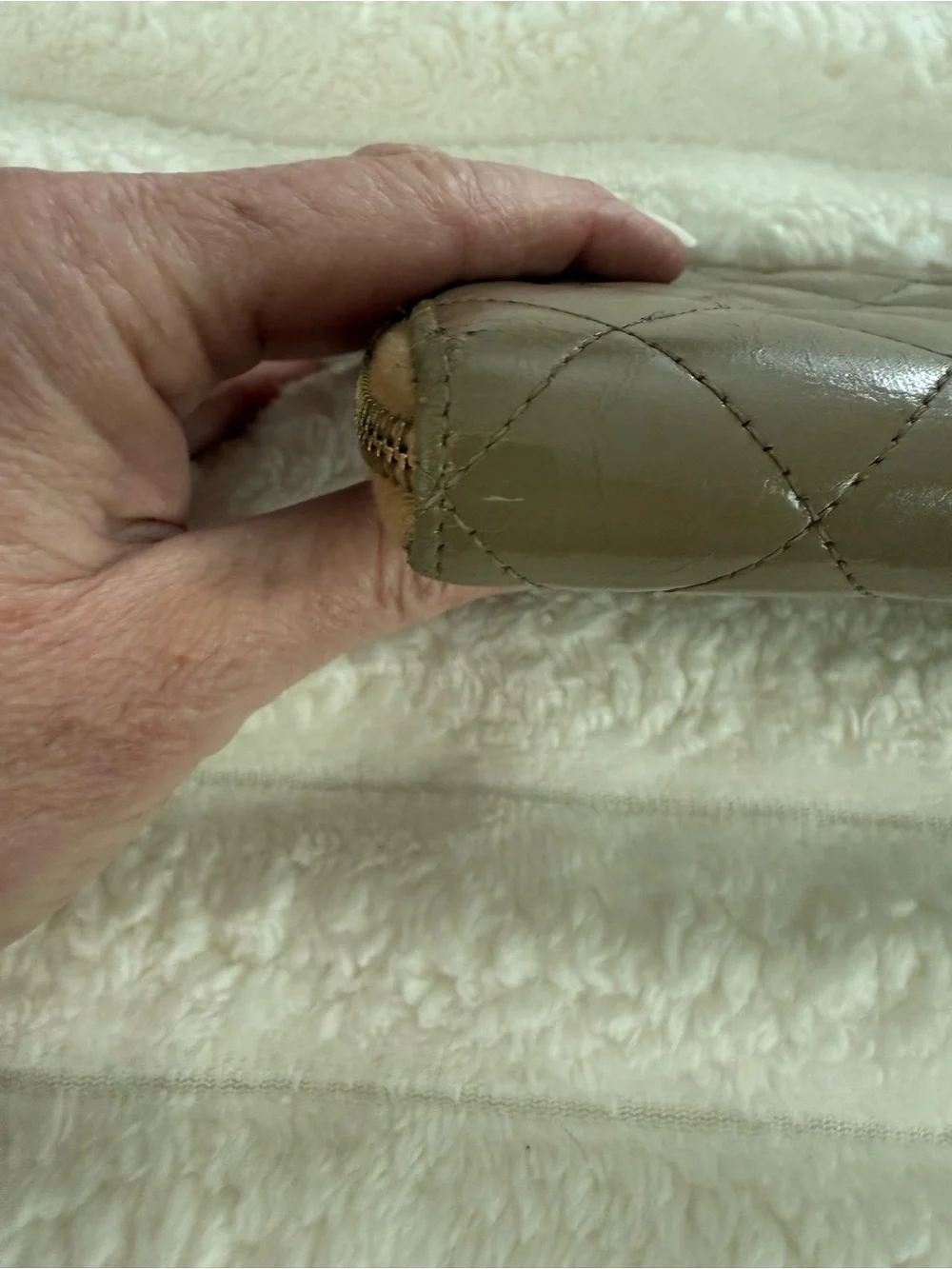 CHANEL Quilted Leather Zip Wallet in Brown with Gold CC